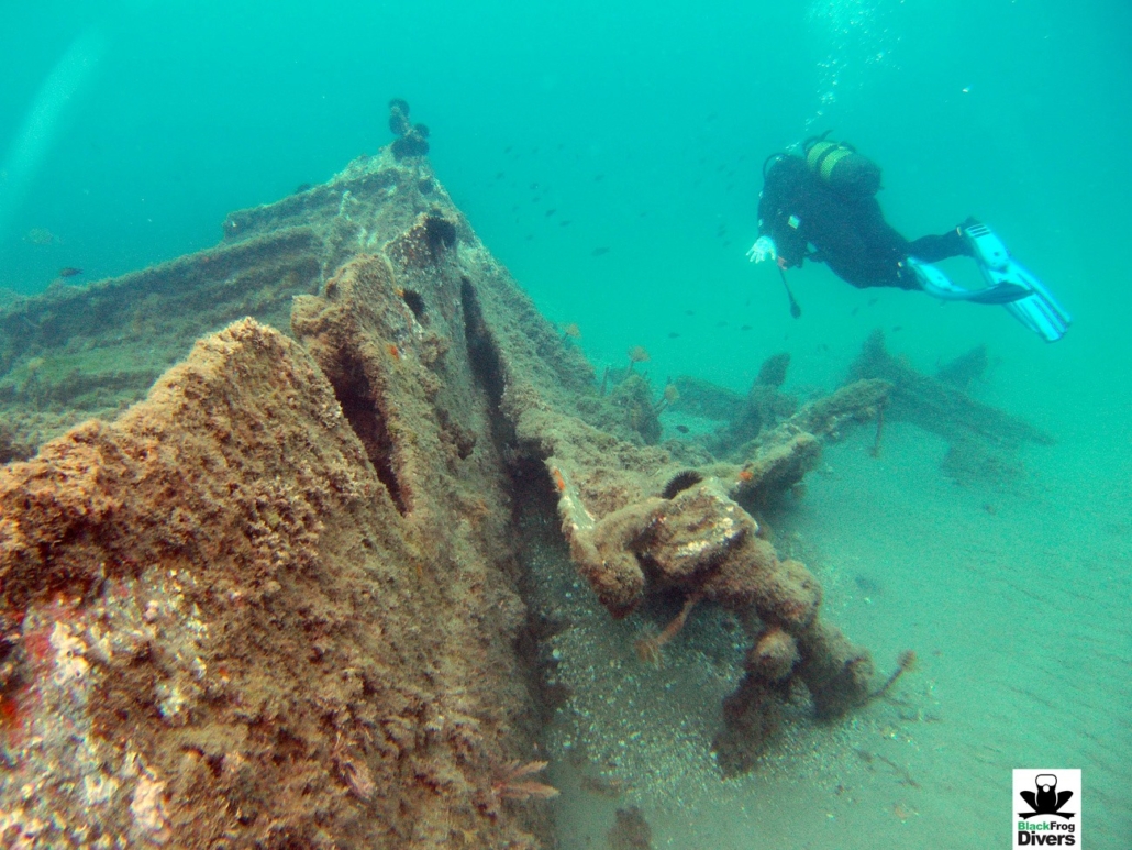 Scuba diver close to the wreck Barco del Arroz in Torrox Costa, Andalucia, Spain. Dive Site in Torrox Costa.